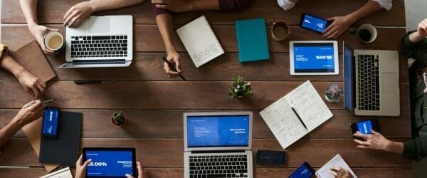 top view photo of people near wooden table