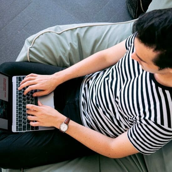 photo of man using laptop