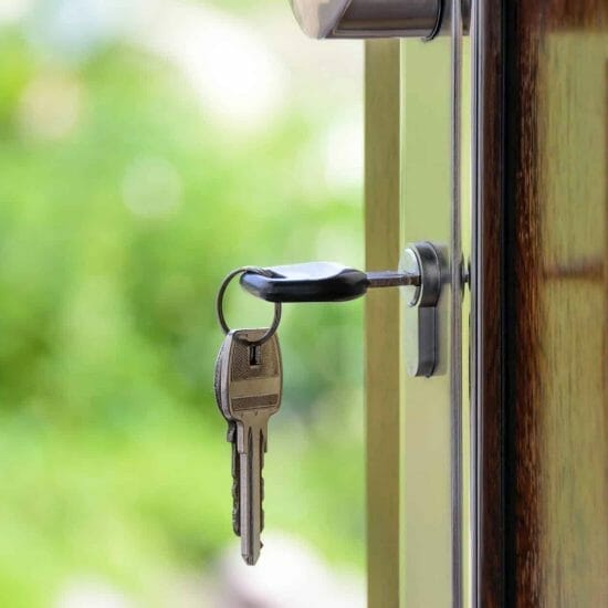 black handled key on key hole