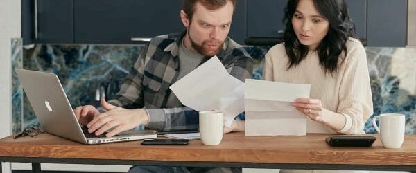 a man and a woman looking surprised