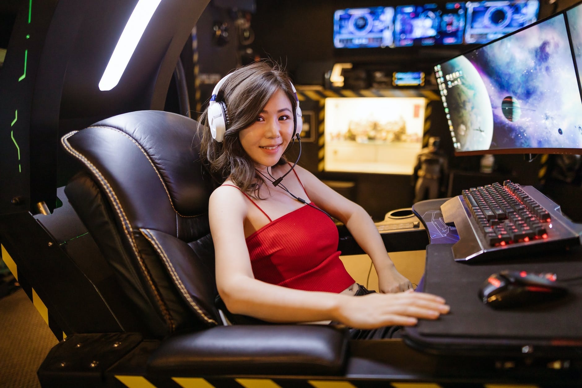 Girl gamer with a gaming setup & obviously a Gaming Mouse