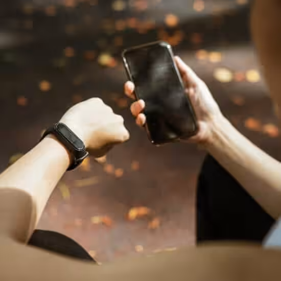 faceless woman using devices for health monitoring