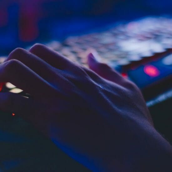 photo of person typing on computer keyboard