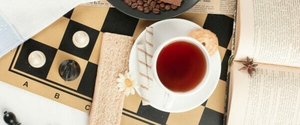 tea cup book chessboard