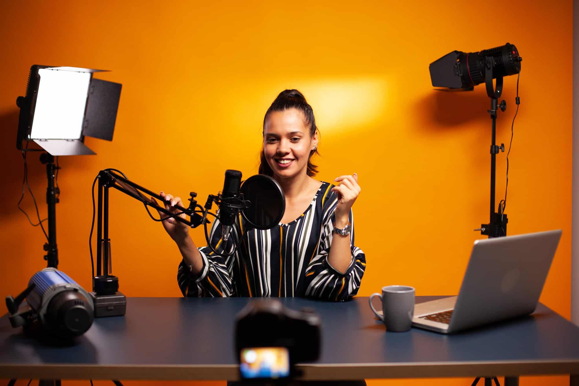 famous vlogger recording video using professional recording gear