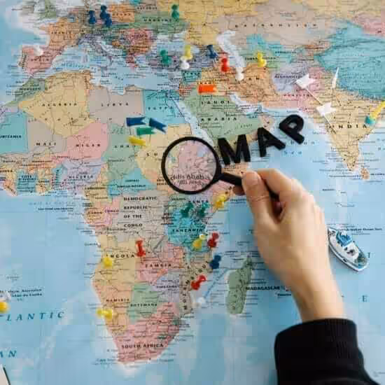 person holding magnifying glass