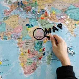 person holding magnifying glass