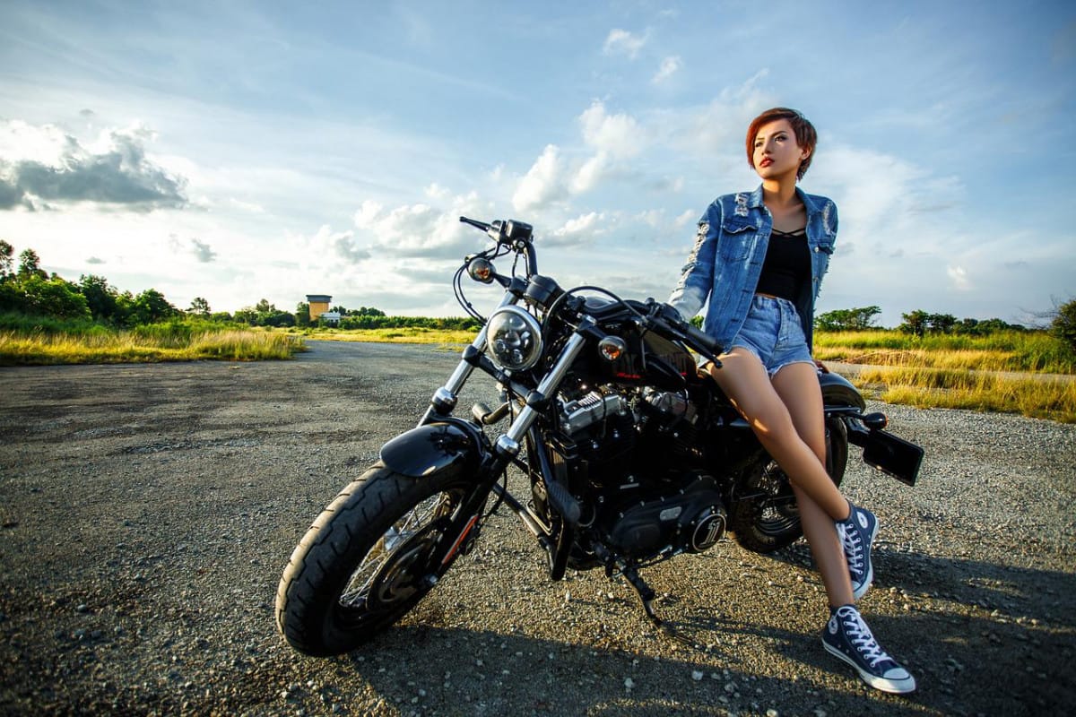 A girl with an old bike