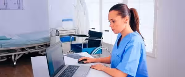 nurse analysing list patients laptop therapist typing computer consult patient online medical physician medicine uniform writing list consulted diagnosed patients making research