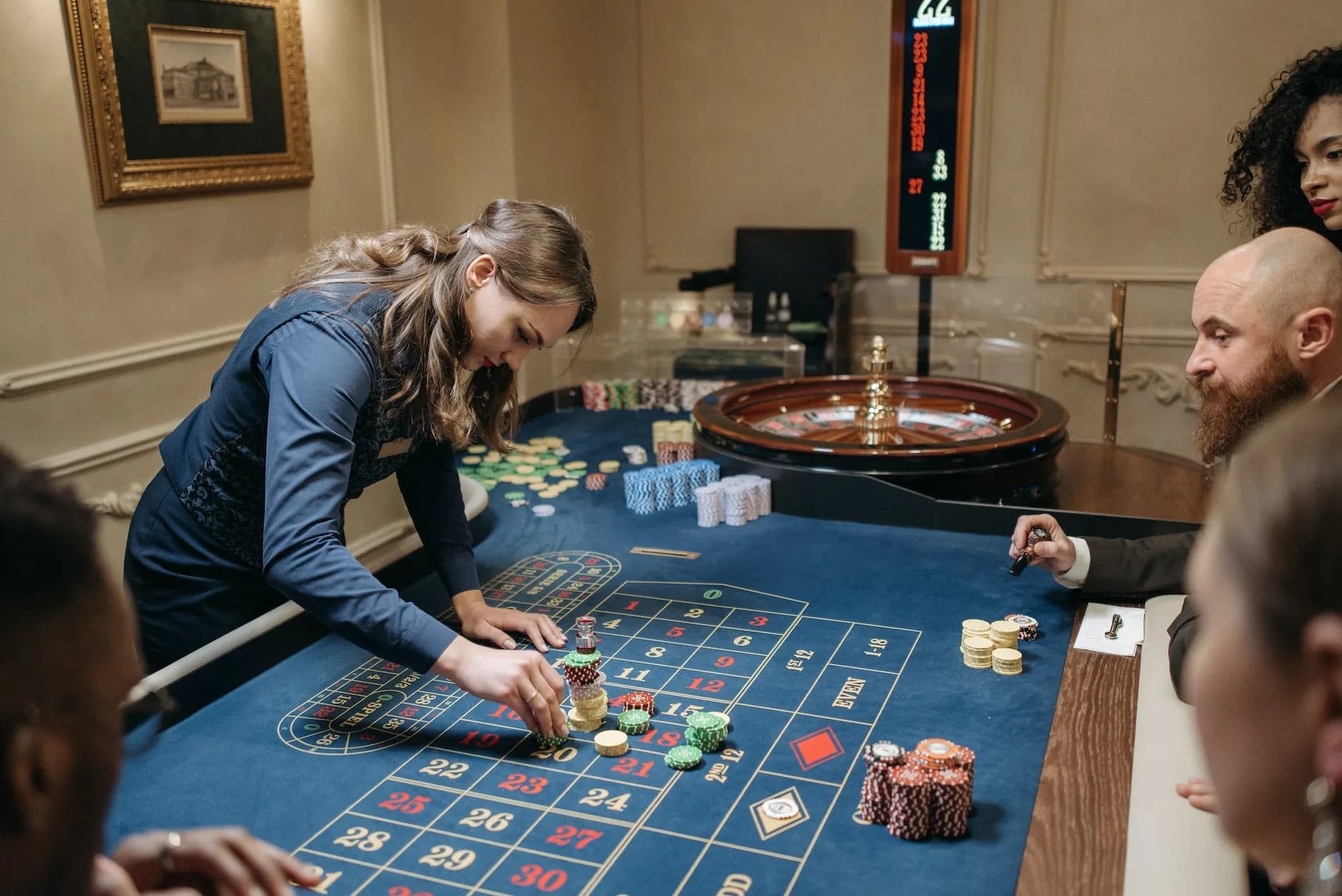 woman holding the poker chips