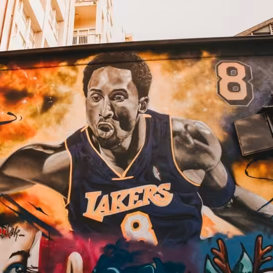 a mural of a basketball player on a building
