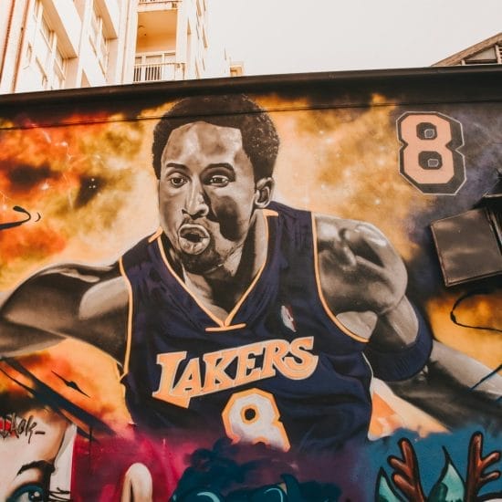 a mural of a basketball player on a building