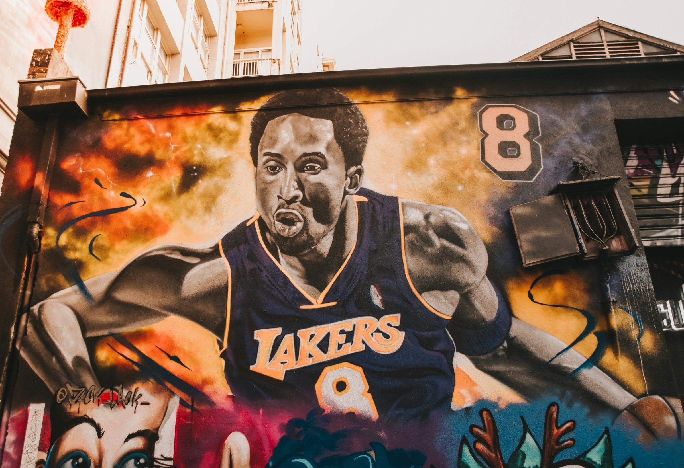 a mural of a basketball player on a building