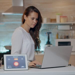 Woman working in modern kitchen