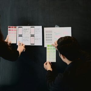 Designers collaborating on user interface mockups